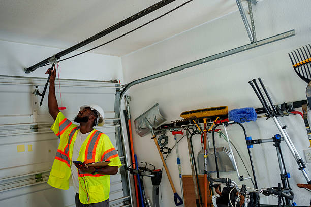 Professional Garage Door Panel Replacement technician working in Russellville, AL
